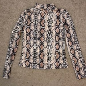 Leopard print turtle neck